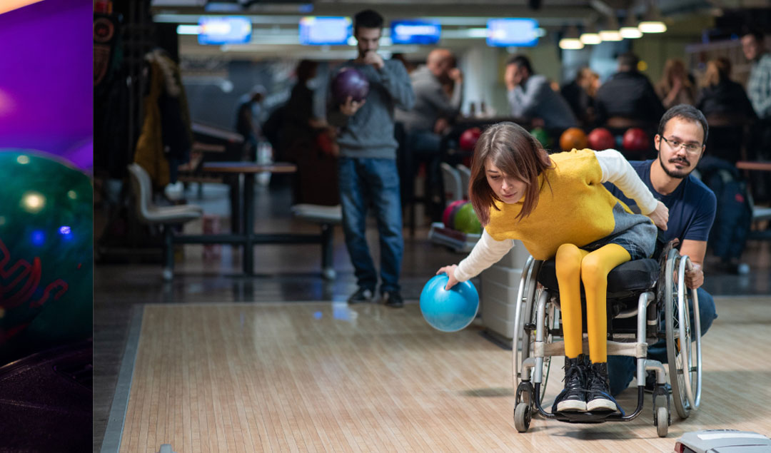 person in wheelchair demonstrating adaptive bowling