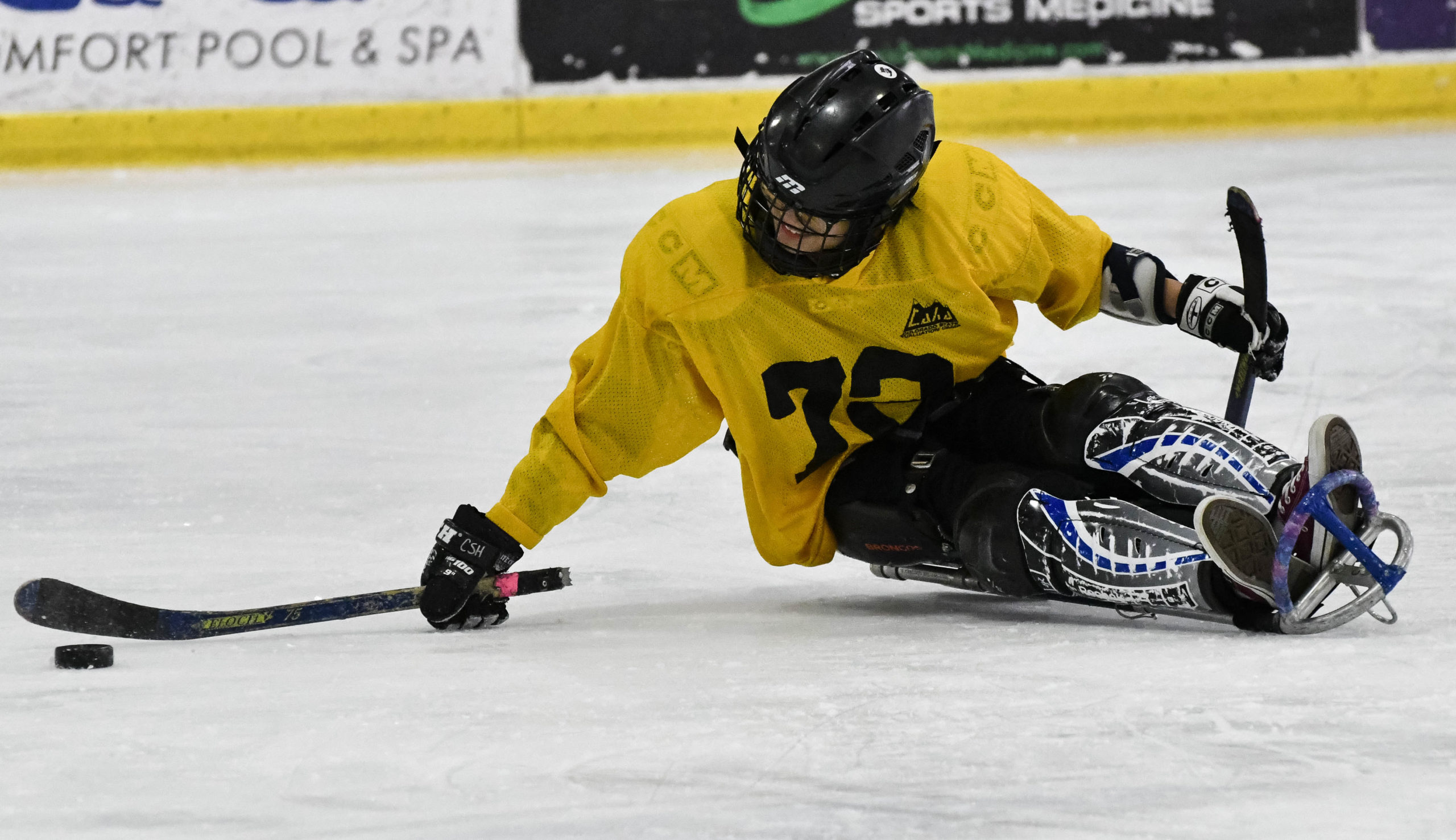 Athlete playing sled hockey