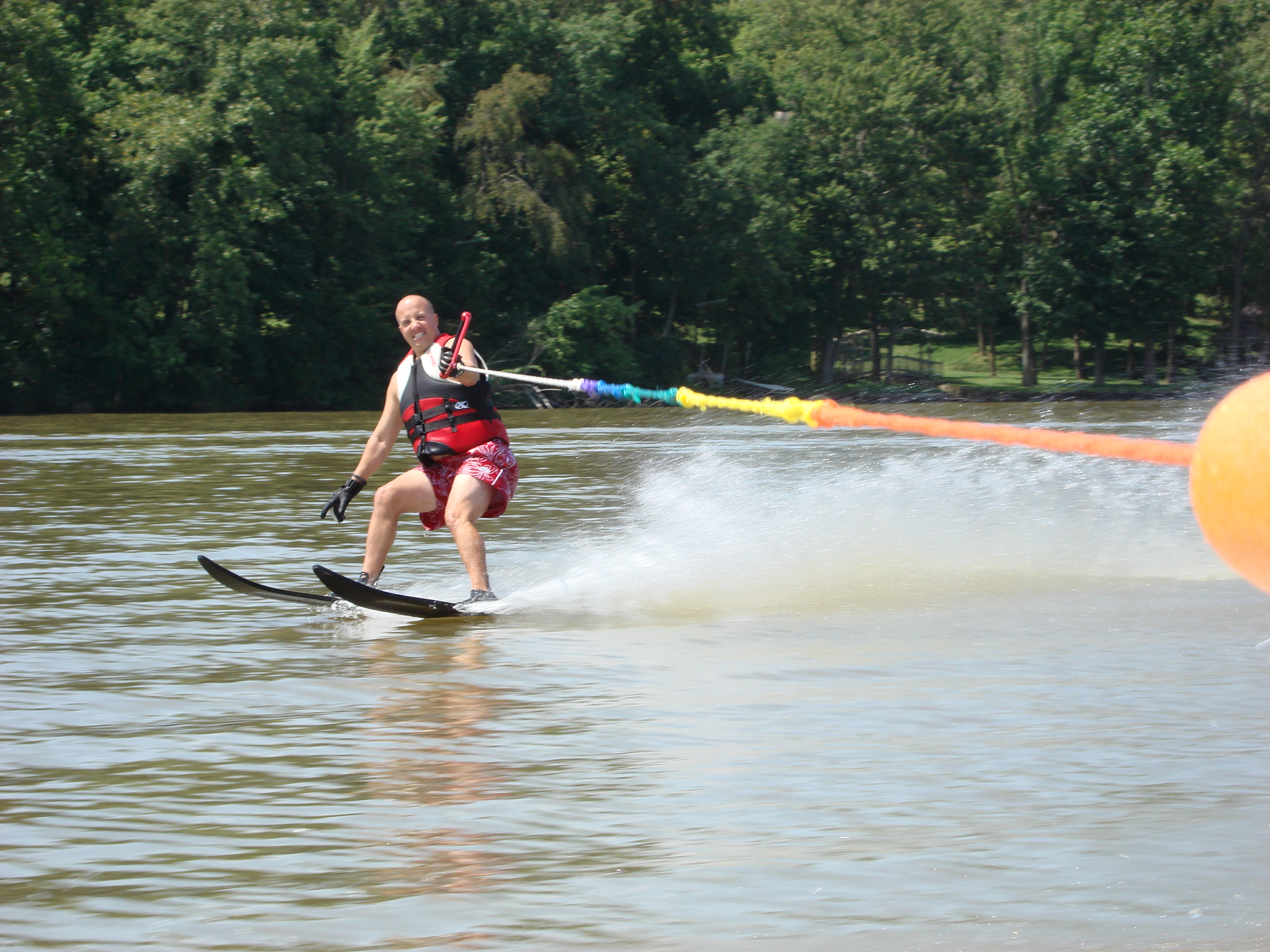 Athlete water skiing on water