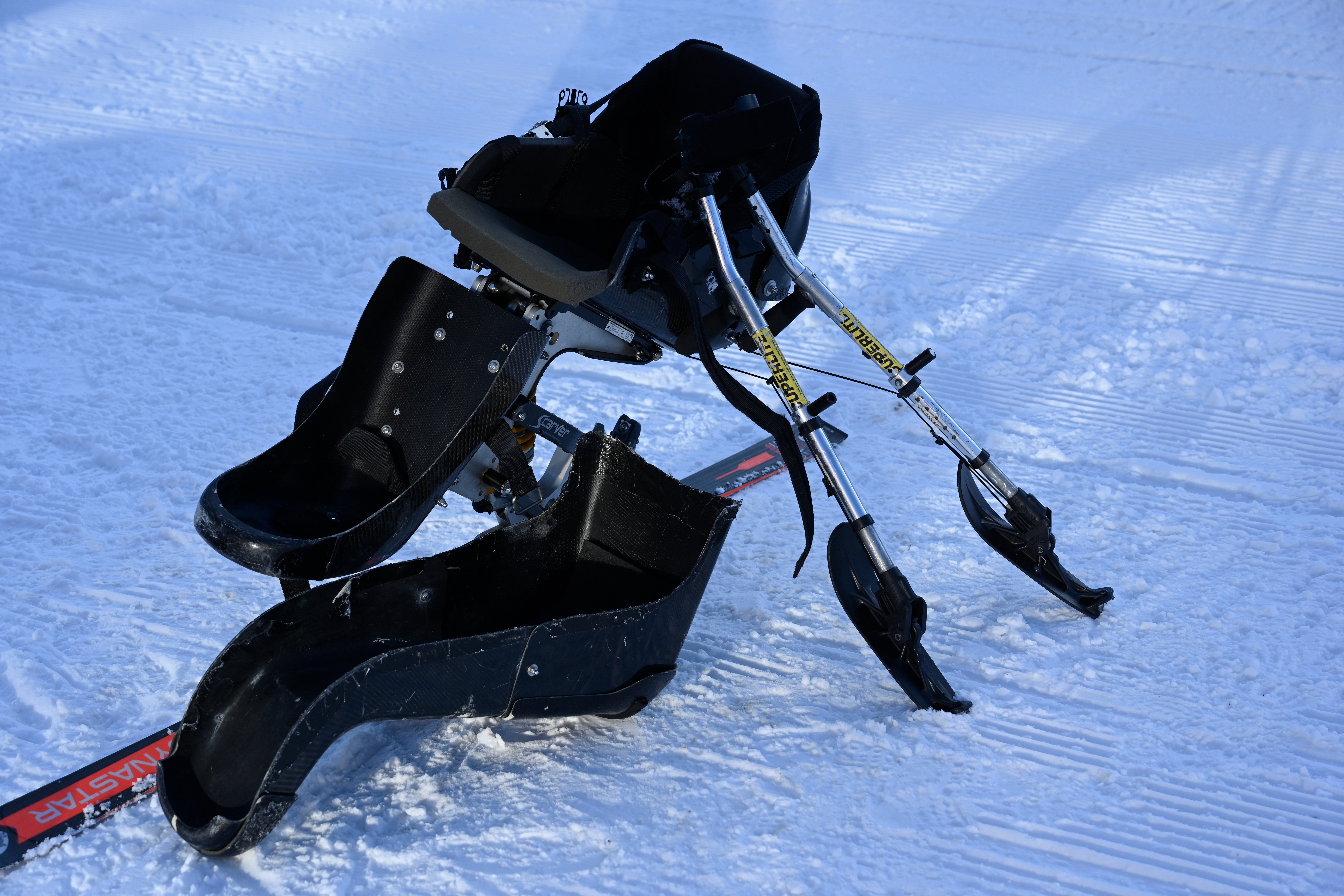 Mono-ski upright on the ground