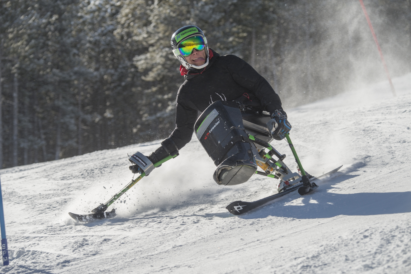 Athlete skiing on a mono-ski