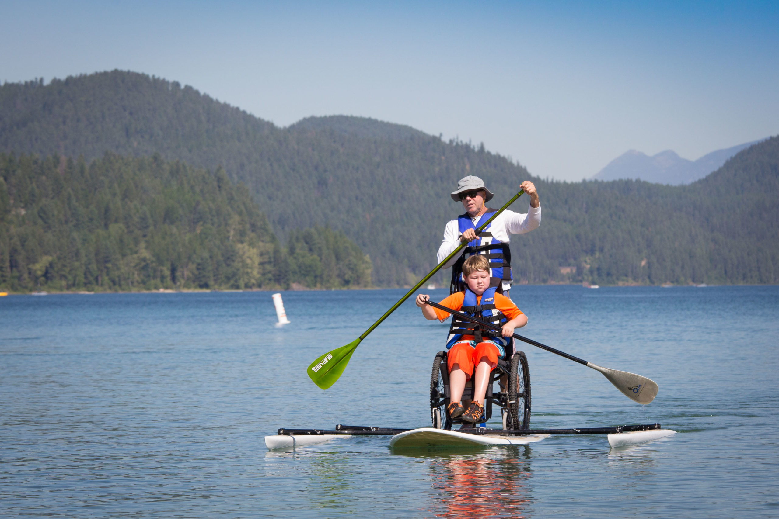 WC paddle board athlete on lake