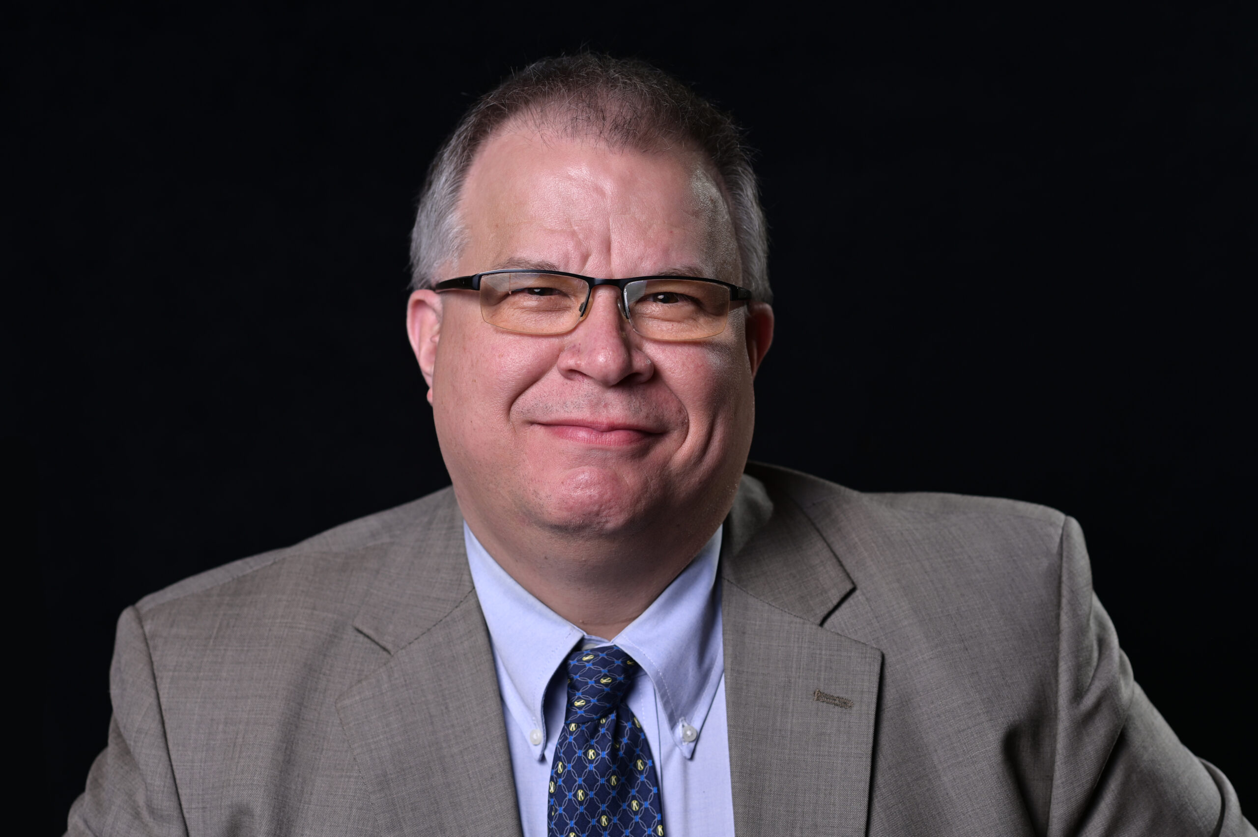 Headshot of Move United's Communication Manager, Shuan Butcher