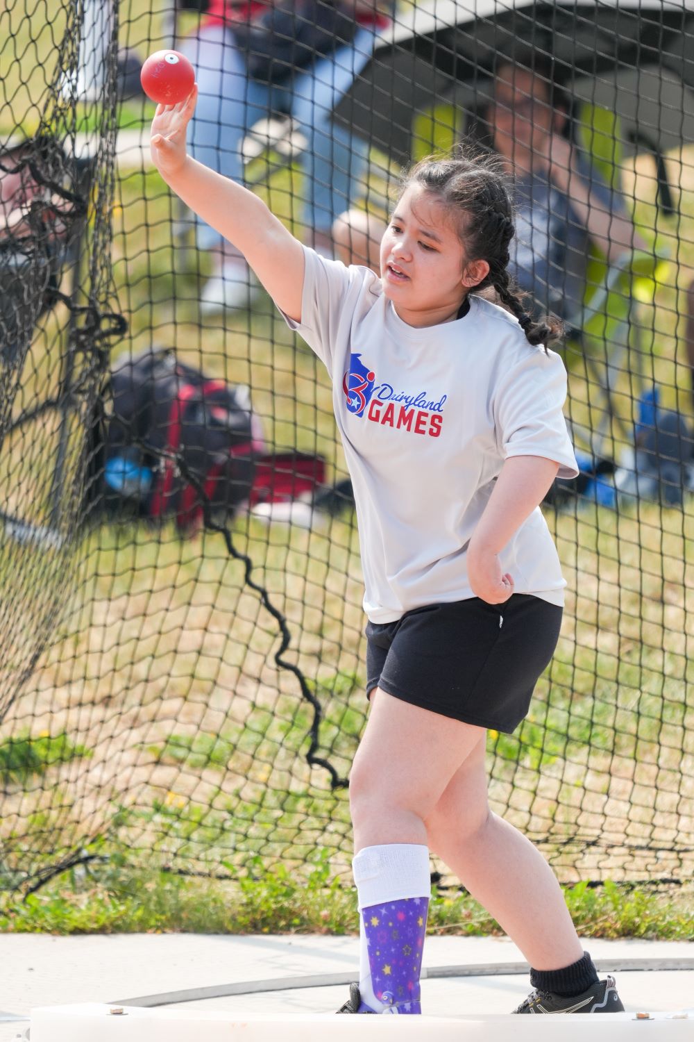 Ambulatory athlete throwing the shot put