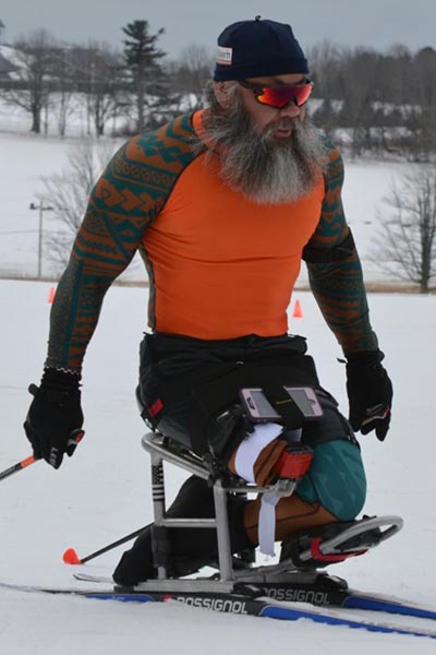 Male athlete on Nordic sitski