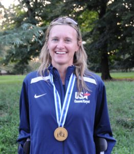 Female athlete with medal around neck