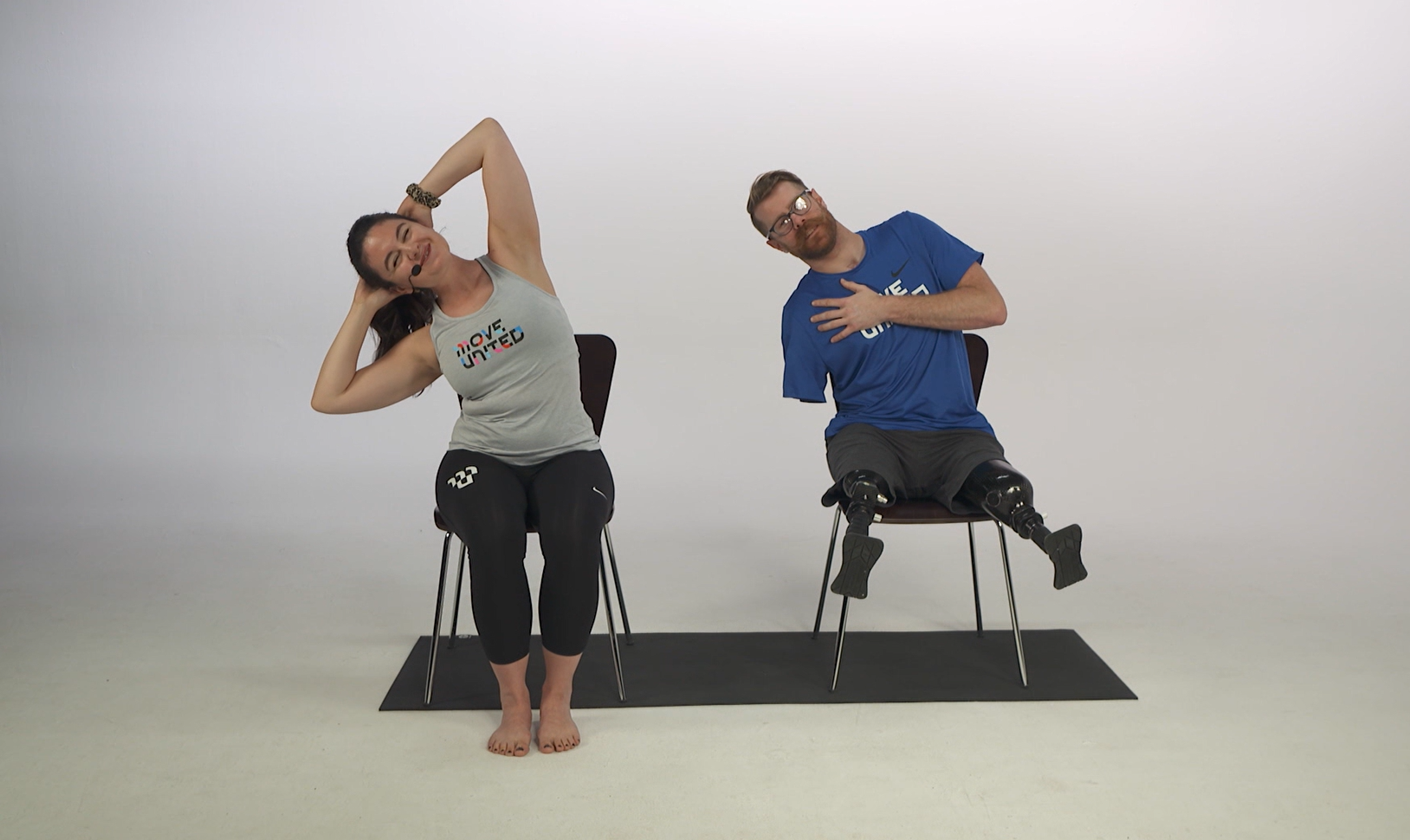 Yoga Instructor Laura with Student Zach leading OnDemand workout