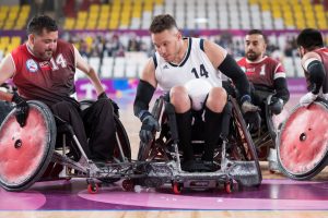 Wheelchair Rugby player Joe Delagrave with ball