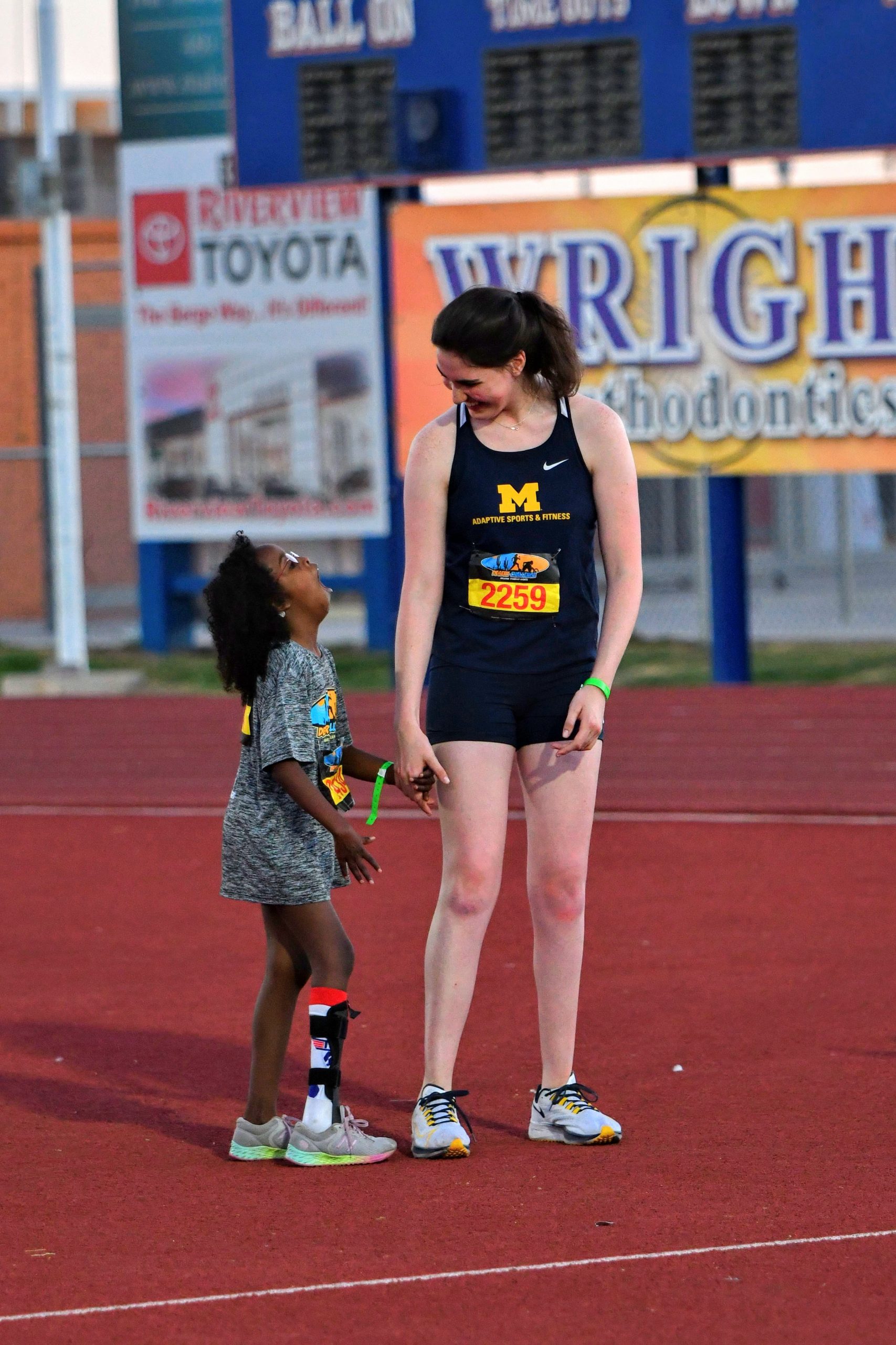 Desert Challenge Games two female ambulatory track athletes