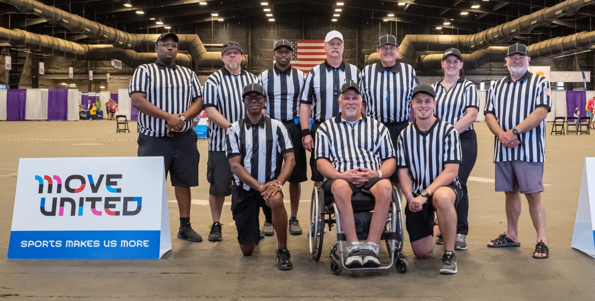 Referees from the USAWFL pose for a photo together