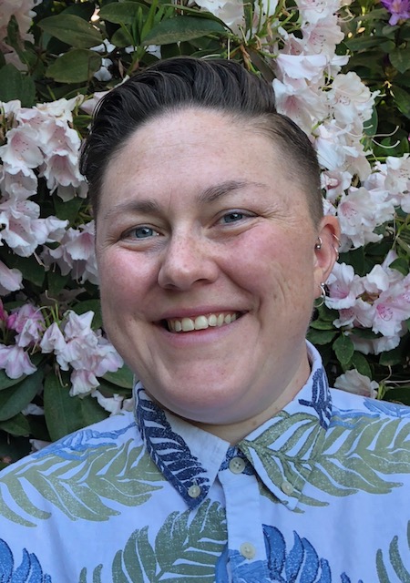 Headshot of a staff member with a floral background