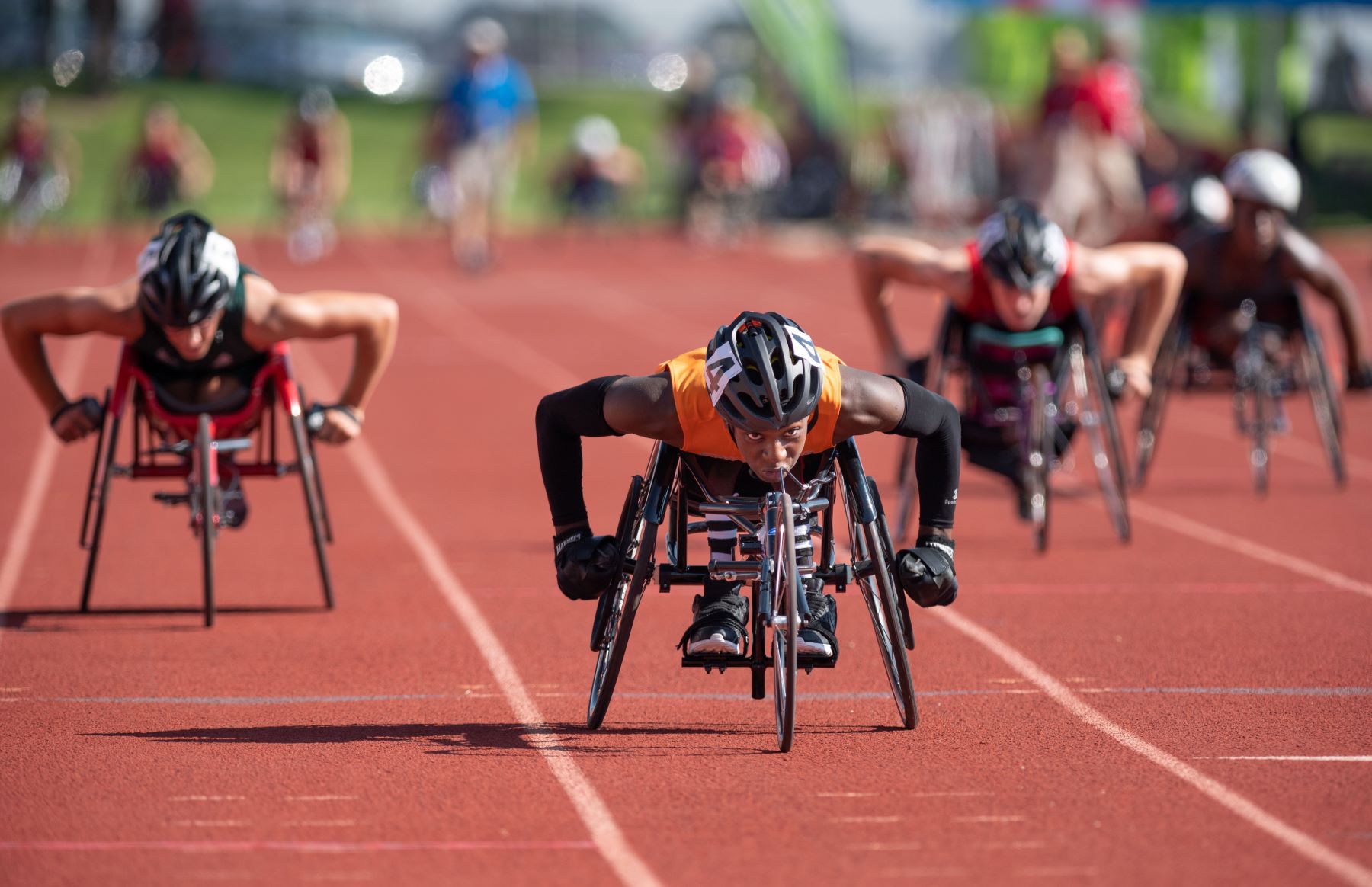 Wheelchair racers compete on the track