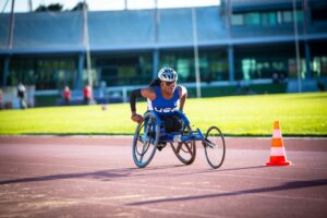 Lauren Fields competes in wheelchair racing at the IWAS World Games 2022