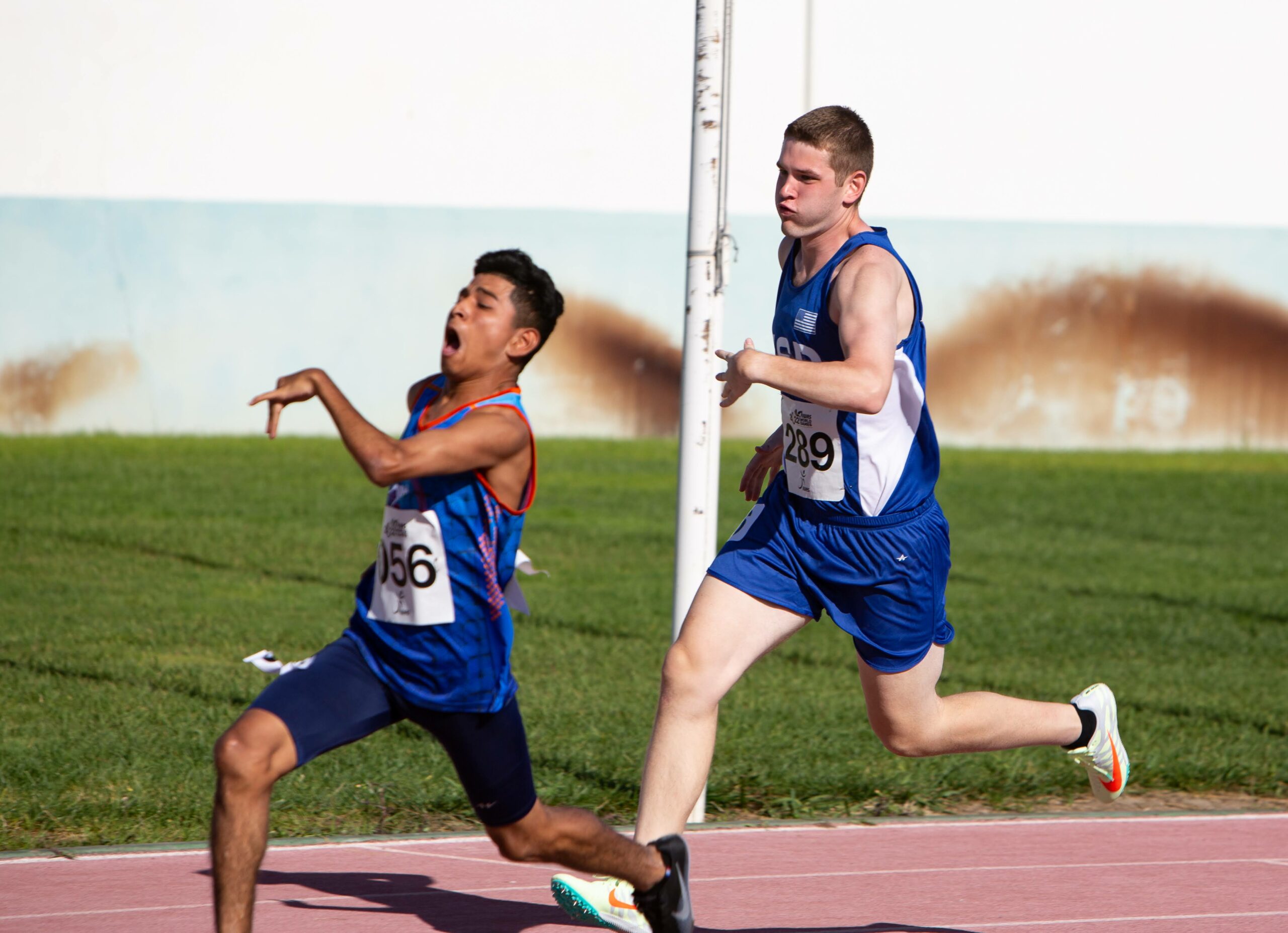 Ben Brandt competing in an international track competition against another runner