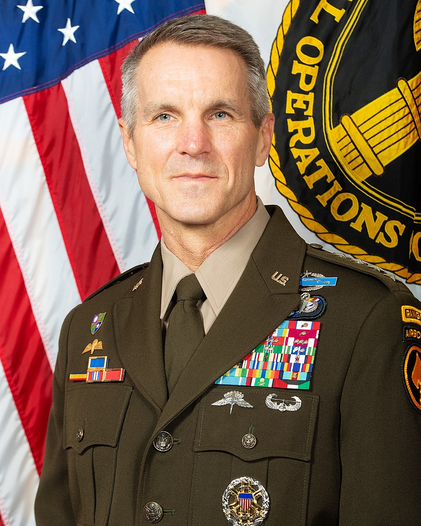 Picture of General Richard D. Clarke in uniform in front of a US flag.