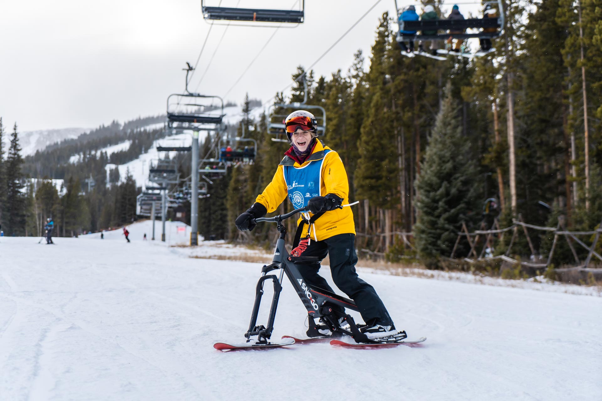 Individual on a Sno Go Ski Bike on a mountain slope