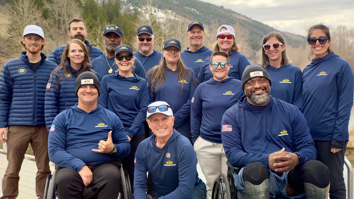 Group of participants smiling and posing for the camera