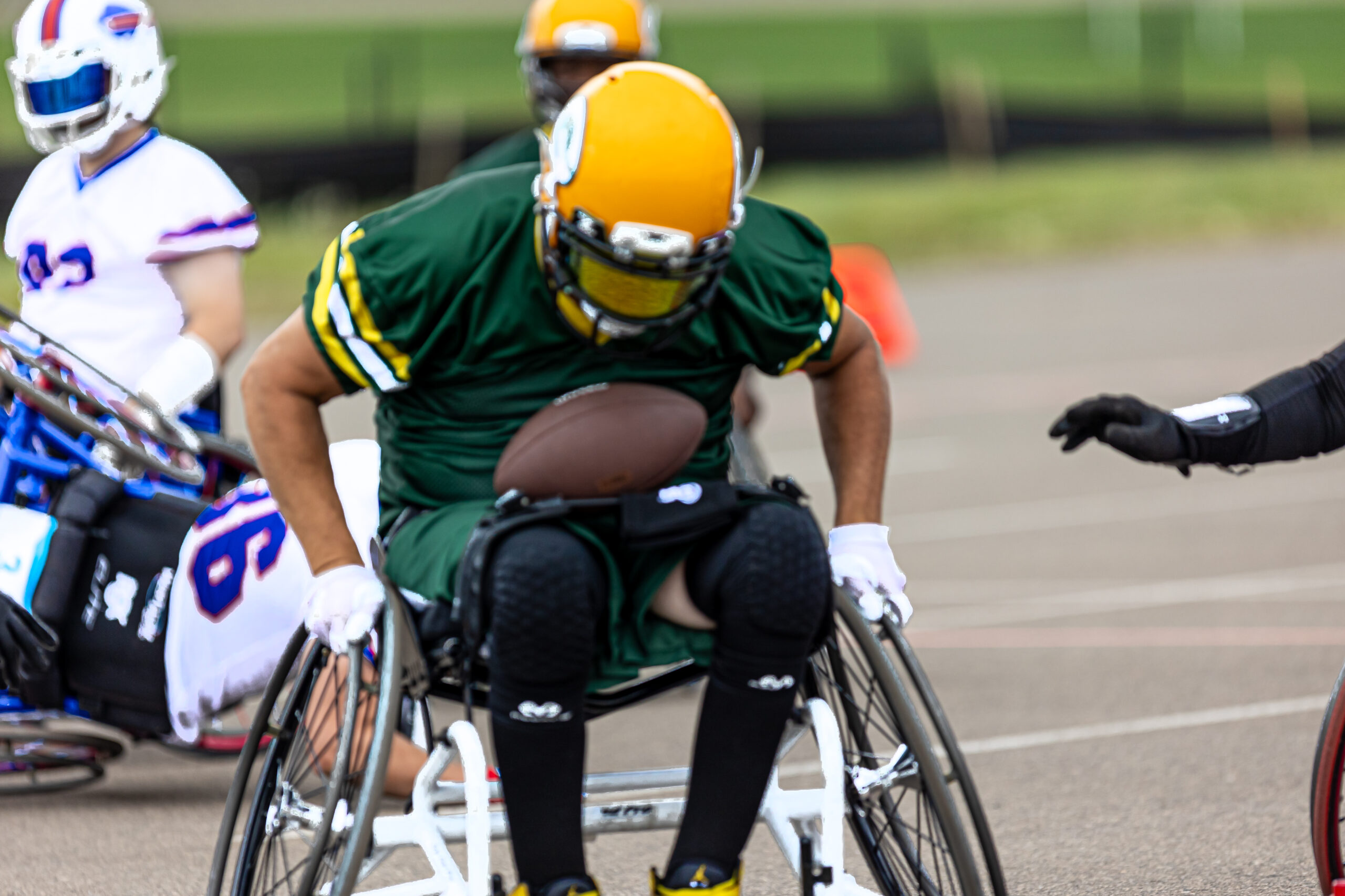 GB Packers WC Football Team Athlete Pushing with the Football