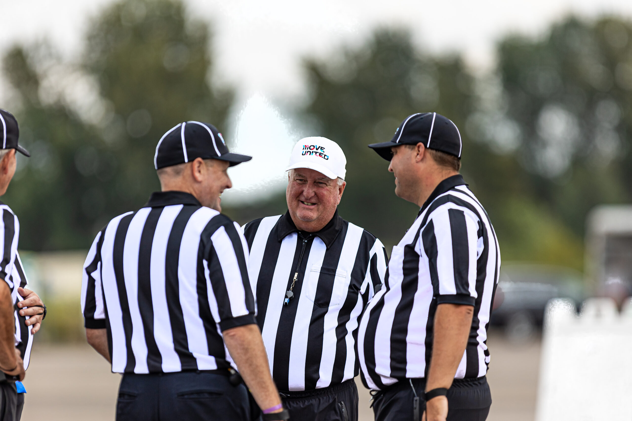 USAWFL Officials laughing in a group