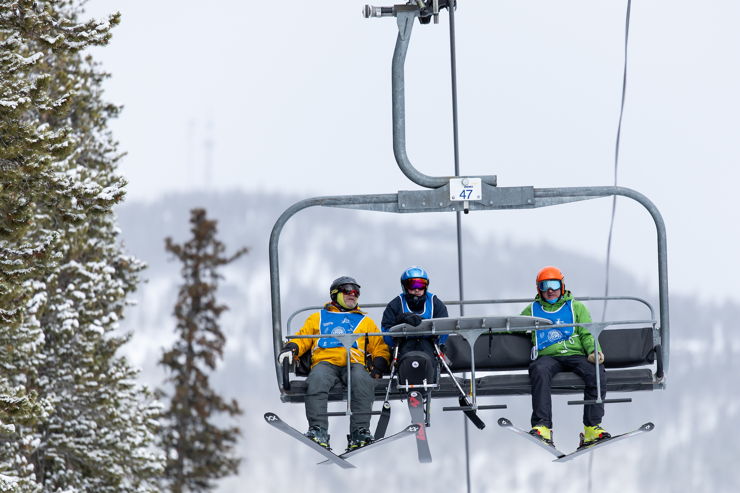 3 Skiers on a ski lift