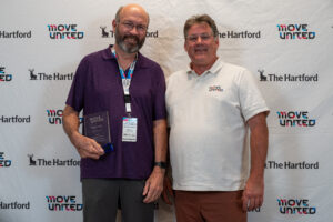 Move United CEO Glenn Merry, right, with Adaptive Sports Hall of Fame Inductee Kevin Carr