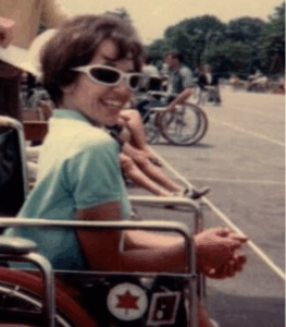 Bobbi Giesse smiling and wearing sunglasses