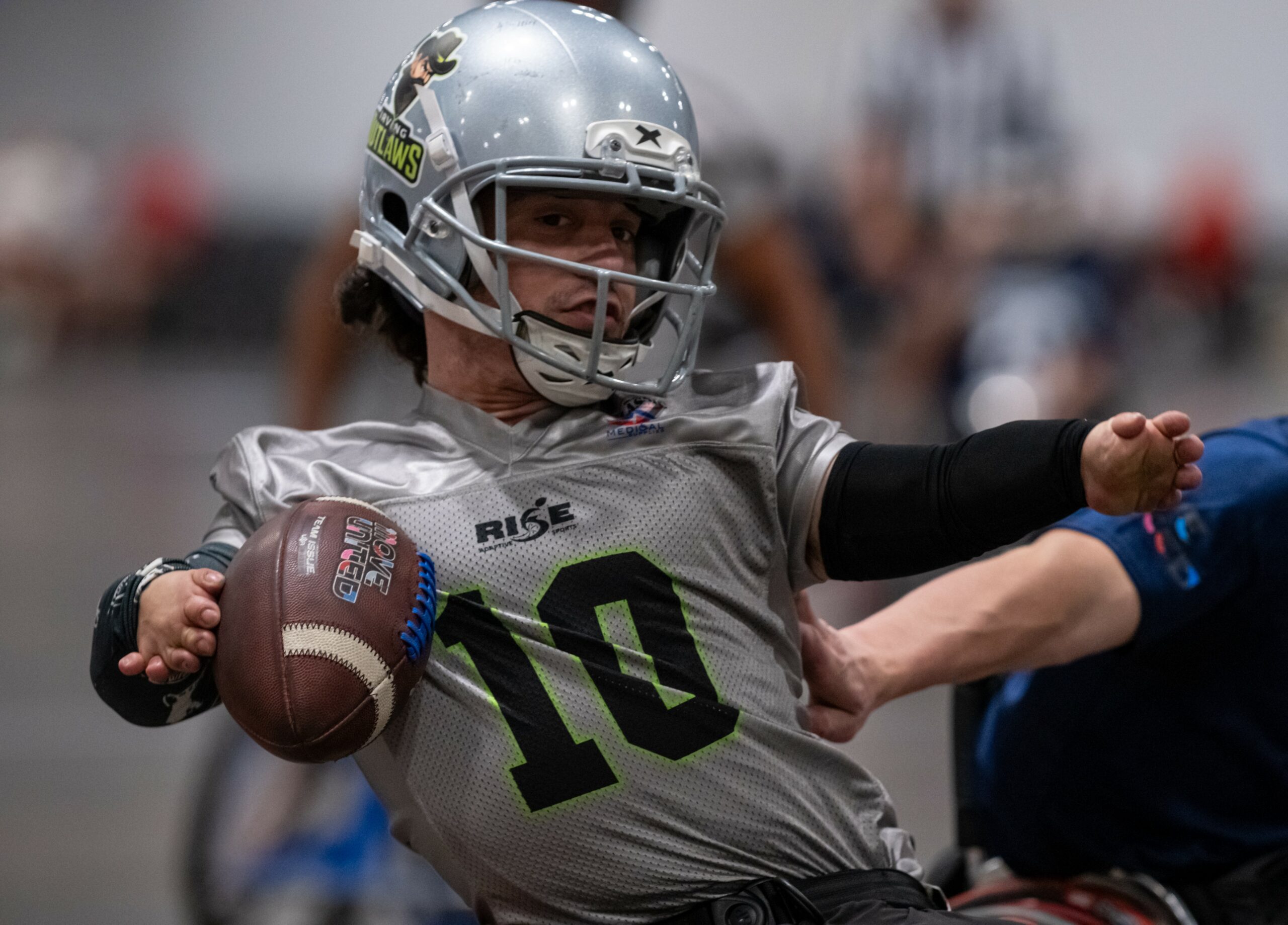 USAWFL Irving athlete dodging a tackle