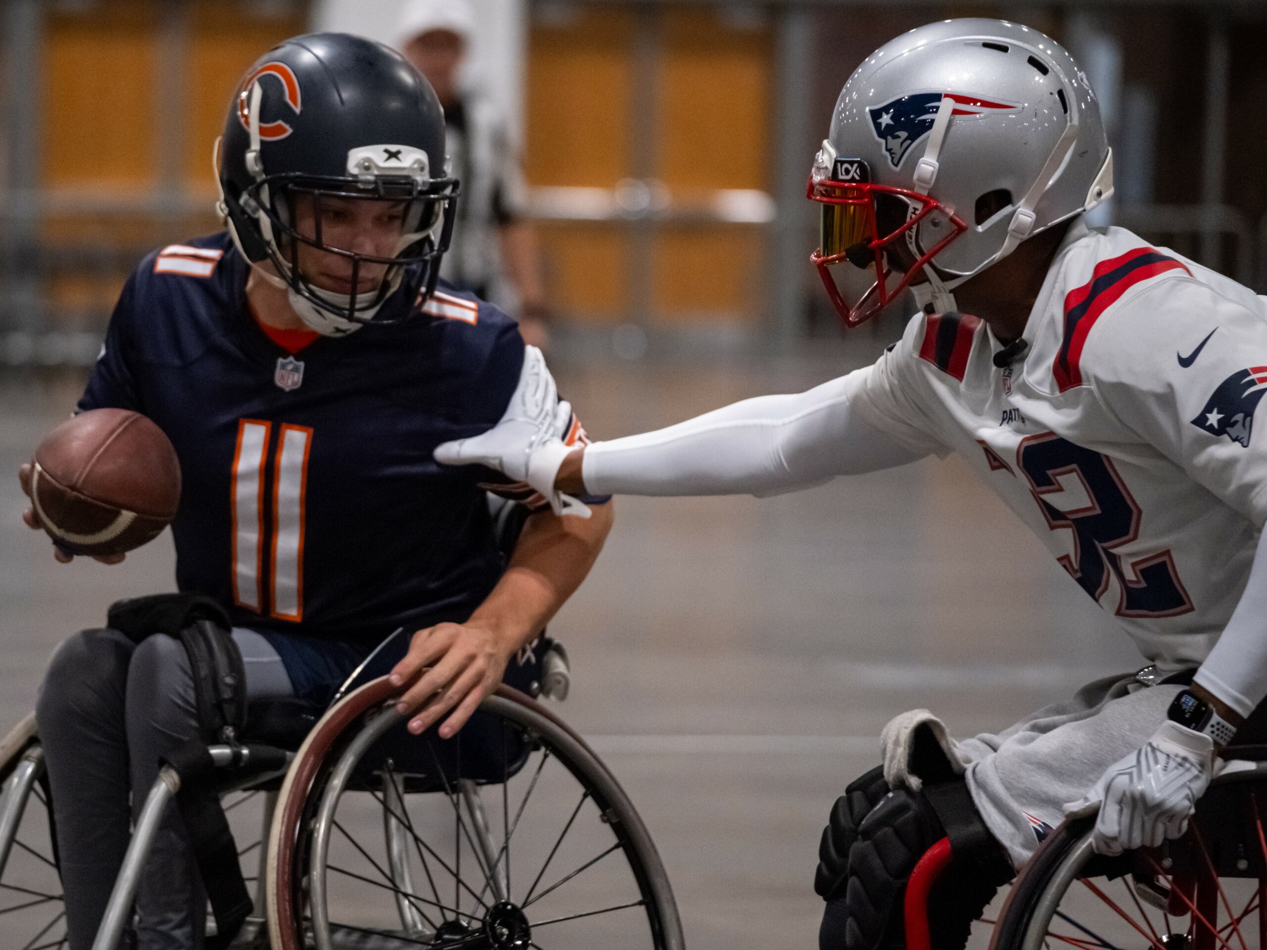 USAWFL Patriots athlete tacking a Bears athlete