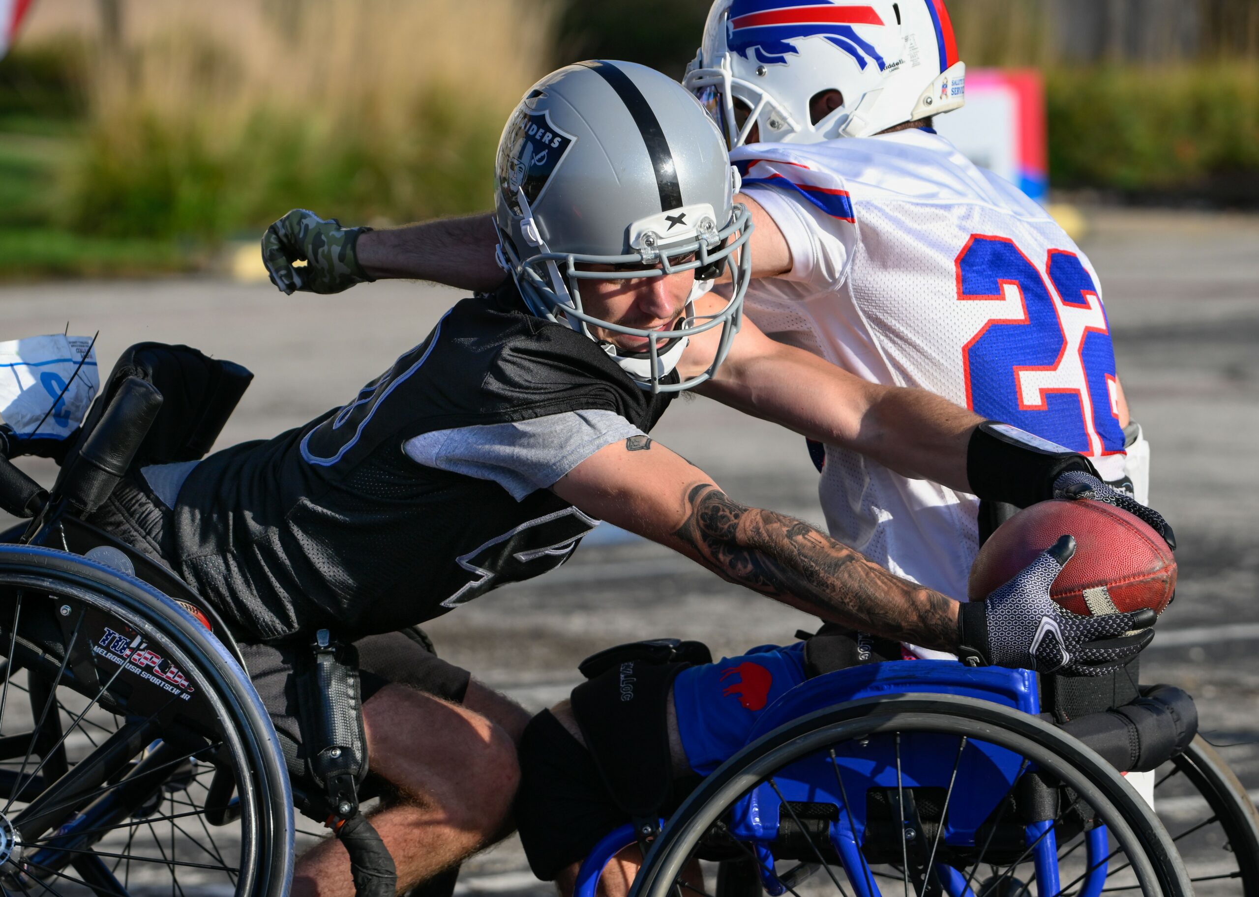 USAWFL Las Vegas raiders athlete diving for a touchdown
