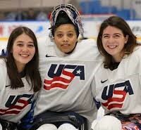 Gaby Wake with Sled Hockey Teammates