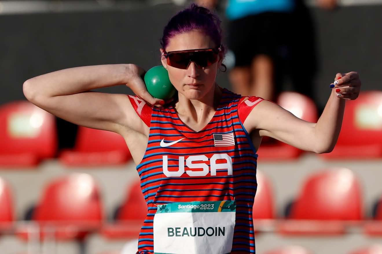 photo of Margaret Beaudoin, Move United Member Athlete competing in throwing at The Hartford Nationals and wearing a Team USA jersey