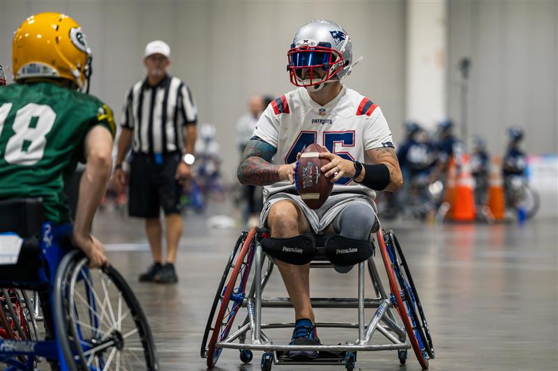 Two football players compete against each other in a game