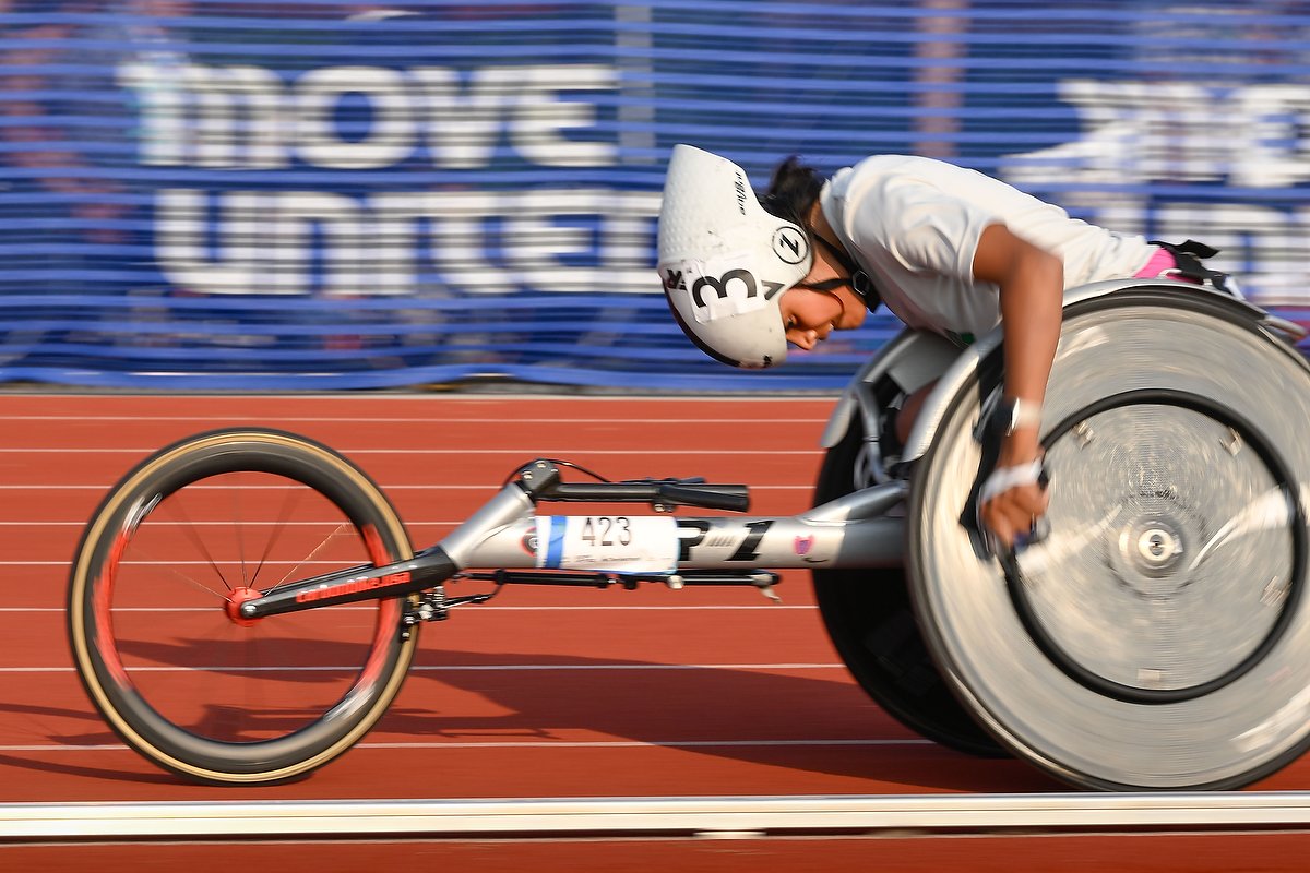 Adaptive athlete pushing on the track