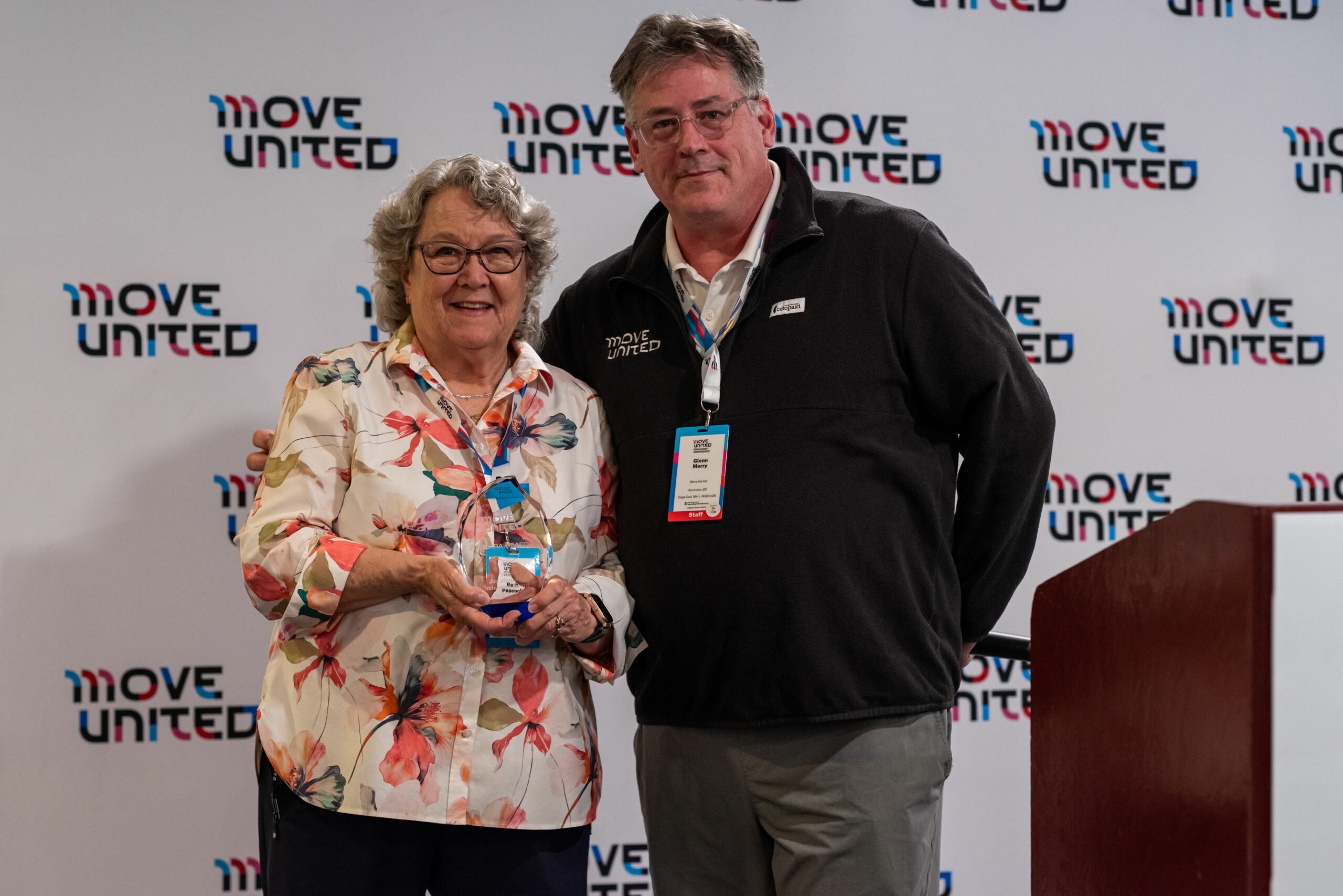 Barb Peacock accepts Jim Winthers Award from Glenn Merry