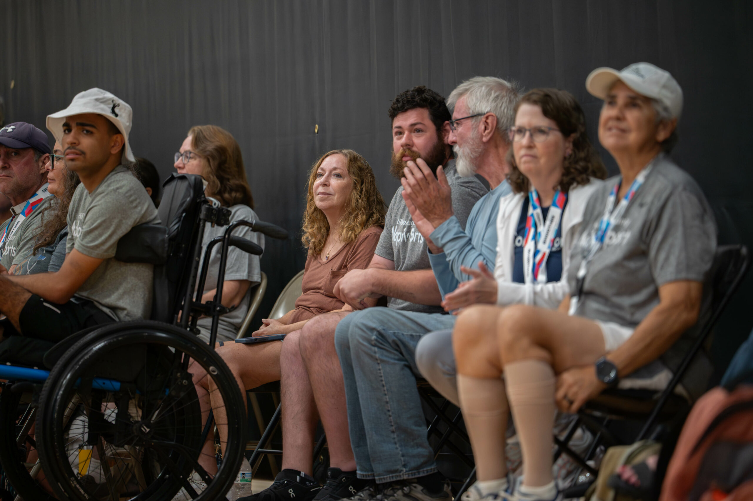 Observers in a crowd watching event