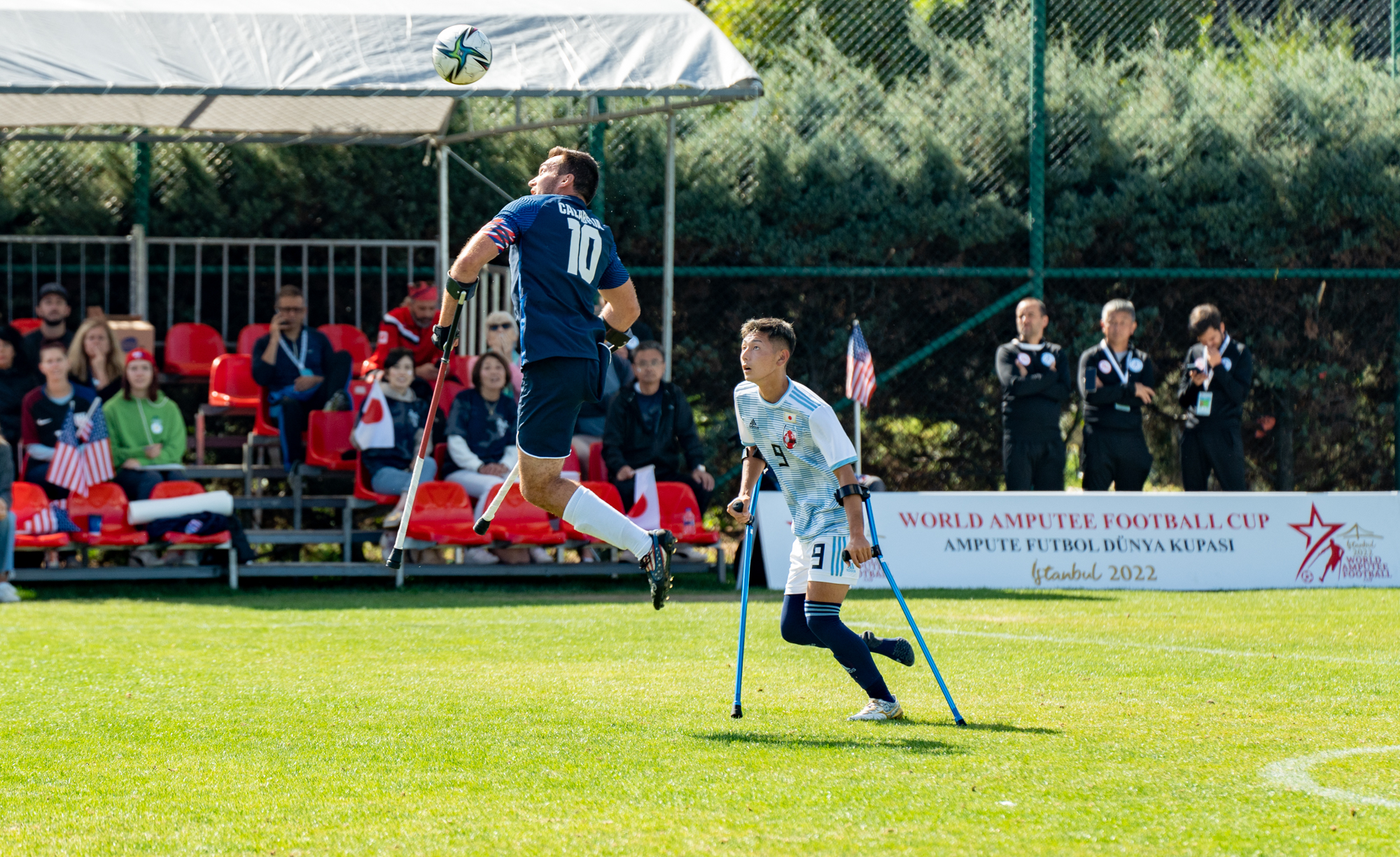 Nico Calabria preparing to hit the ball with his head during an amputee soccer match