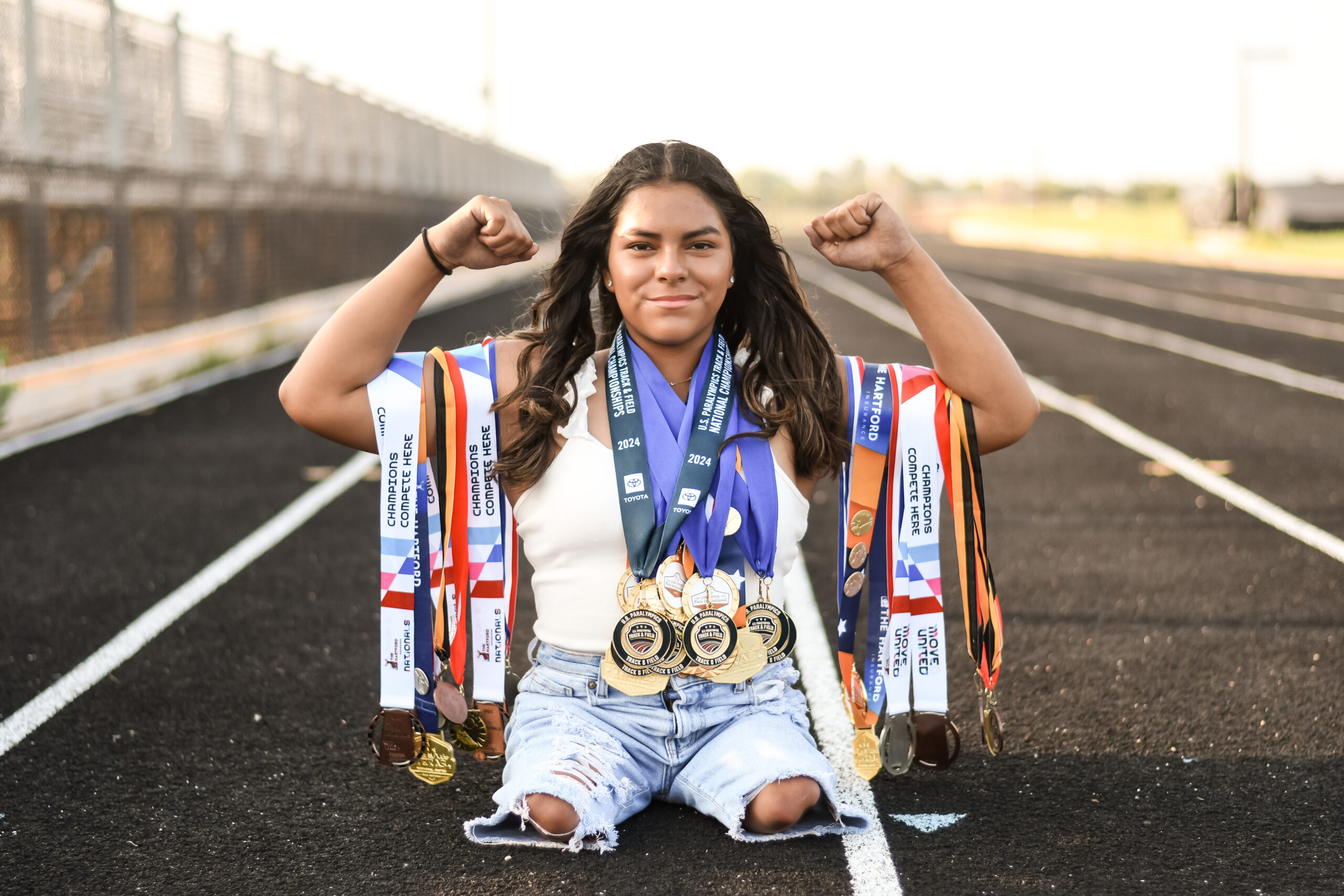 Athlete displaying medals