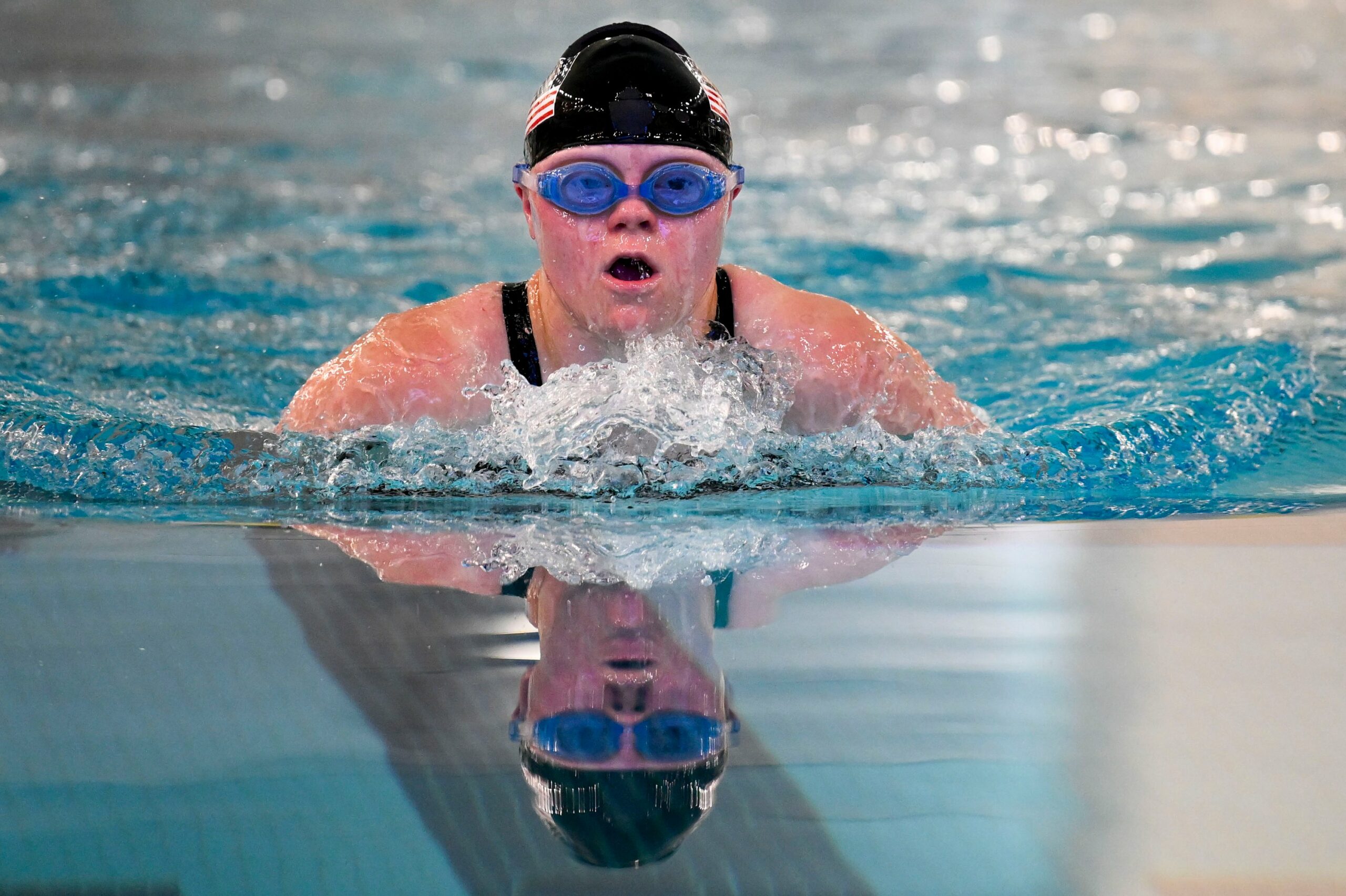 Swimmer in the pool swimming breaststroke